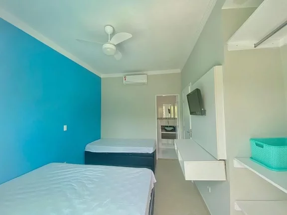 Imagem Sobrado de Luxo à Venda em Condomínio na Morada da Praia, Bertioga-SP: 4 Quartos, 4 Suítes, 5 Banheiros, 4 Vagas, 370m².