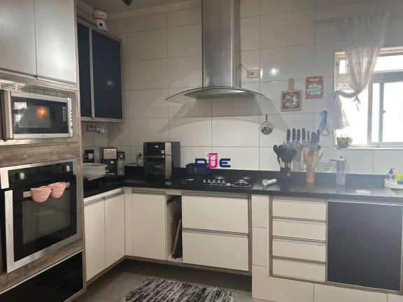Imagem Sobreposta alta com 4 suítes, piscina e área gourmet à venda na Aparecida – Santos/SP