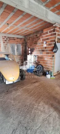 Imagem Terreno 125m² com Salão 43m², Contrato desde o loteador e porão do mesmo tamanho no Jardim Zaíra 4, Mauá-SP