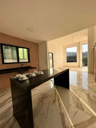 Imagem Casa com 3 dormitórios à venda, 150 m² por R$ 1.700.000,00 - Condomínio Aruã - Mogi das Cruzes/SP