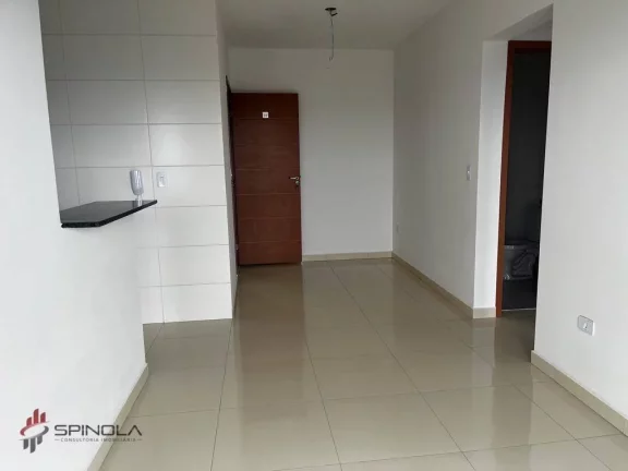 Imagem Apartamento com 2 dormitórios à venda, 67 m² por R$ 410.000,00 - Maracanã - Praia Grande/SP