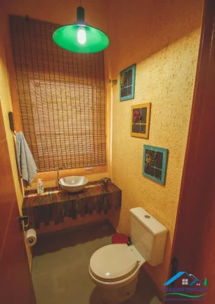 Imagem Sobrado Luxuoso em Condomínio Fechado: 4 dormitórios e Vista Privilegiada!
