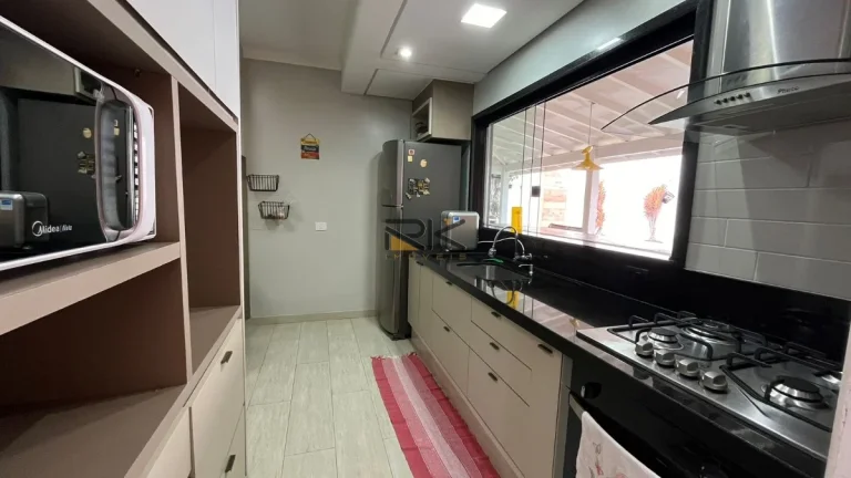 Imagem SOBRADO A VENDA NO CENTRO COM 3 DORMITÓRIOS SENDO 1 SUÍTE,SALA DE ESTAR E JANTAR,ESPAÇO GOURMET CM CHURRASQUEIRA