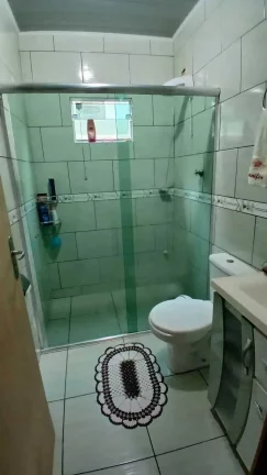 Imagem Casa com 3 dormitórios sendo 1 suíte e 2 vagas de garagem na Adhemar Garcia em Joinville/SC