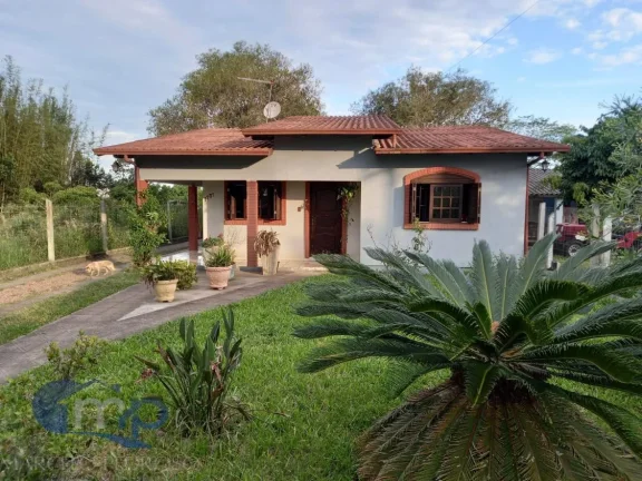 Imagem Casa à venda com 3 dormitórios na Itapeva Sul em Torres/RS