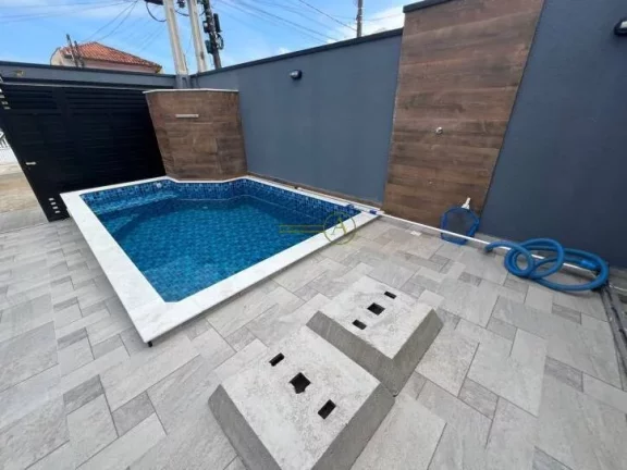 Imagem Casa térrea à venda em Peruíbe Piscina com cascata. Área gourmet com churra