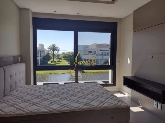 Imagem Belíssima Sobrado no Condomínio Enseada!Cmposto por 05 suítes piscina