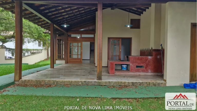 Imagem Casa a venda no condomínio Ipê da Serra, casa com armário e área de lazer com piscina. Venha conhecer no Portal de Nova Lima Imóveis - 31.98511-8000
