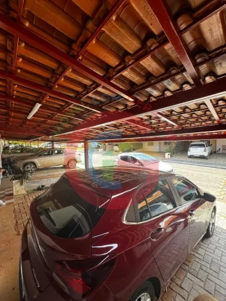 Imagem Casa térrea em condomínio. 2 quartos com 2 vagas.