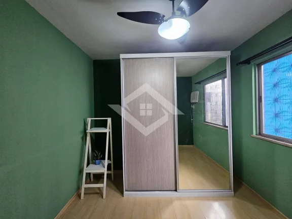 Imagem Casa à Venda na Taquara com 3 Quartos: Opção de Moradia e Negócios