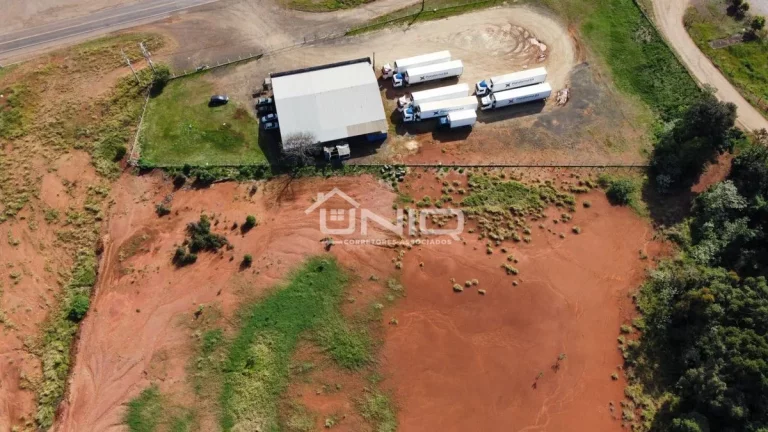 Imagem Terreno com Barracão Comercial Frente para BR