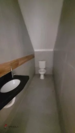 Imagem Sobrado com 2 dormitórios à venda, 57 m² por R$ 350.000,00 - Maracanã - Praia Grande/SP