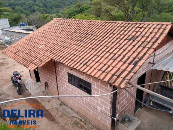 Imagem Chácara em Terra Preta em bairro tranquilo de 1.100m² à venda.