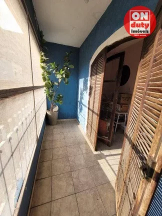 Imagem Casa com 4 dormitórios à venda - 347 m² por R$ 1.100.000 - Vila Matias - Santos/SP