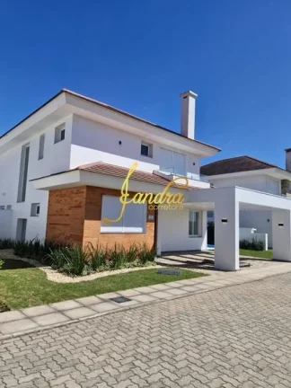 Imagem Sobrado novo, com 04 suítes uma sendo térrea e piscina
