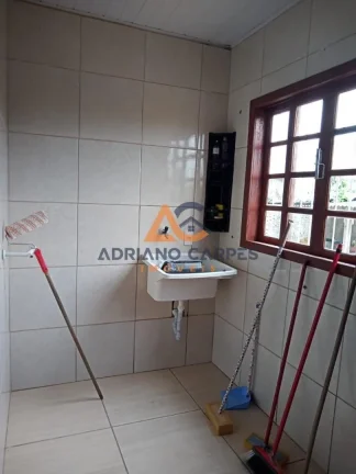 Imagem Casa com 2 dormitórios localizada no bairro Porto escalvados, em Navegantes - Adriano Carpes Imóveis Vende