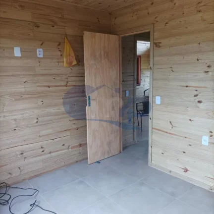 Imagem Casa a venda com 2 dormitorios no Loteamento Pedro Bez Machado em Torres/RS