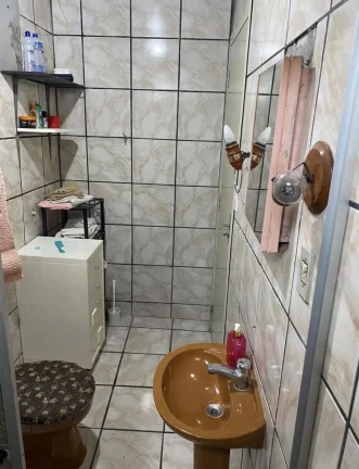 Imagem Casa mista à venda no bairro Gravatá em Navegantes próxima a escola estadual Antonio Rocha e a creche Rosana - Adriano Carpes Imóveis vende