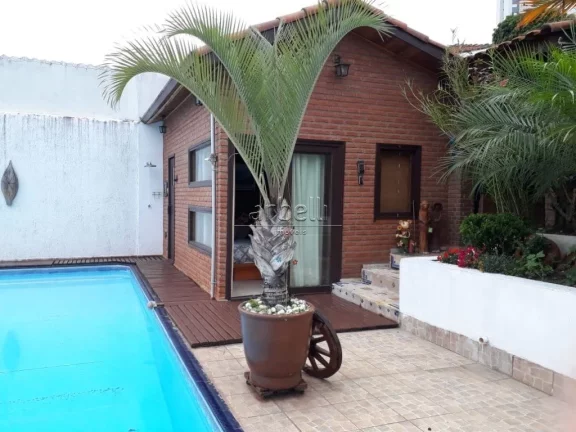 Imagem Casa com 460 metros quadrados de área total e 250 metros quadrados de área construída. Com 4 dorm...