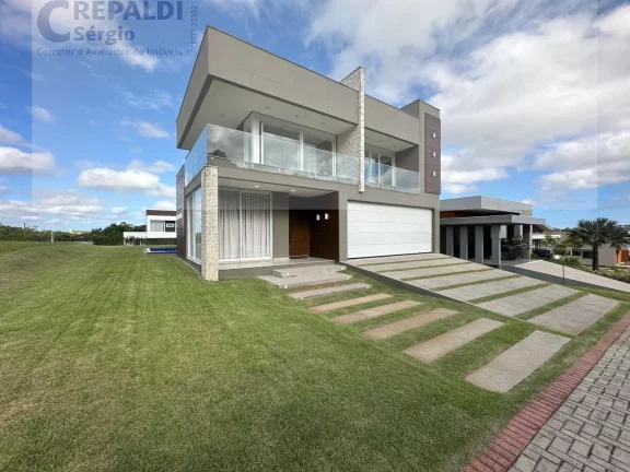 Imagem Casa de luxo em condomínio à venda em Içara-SC, com 3 quartos, 1 suíte e 426,76 m² de área. Confira!