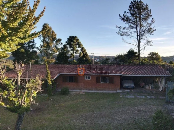 Imagem Casa com 3 dormitórios à venda, 280 m² por R$ 1.220.000 - Alto Do Capivari - Campos do Jordão/SP