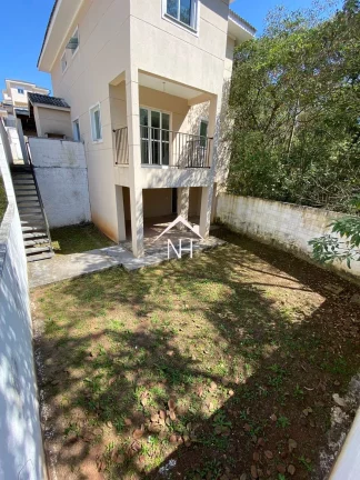 Imagem Casa em condomínio fechado com 3 suítes e 2 vagas na Granja Viana