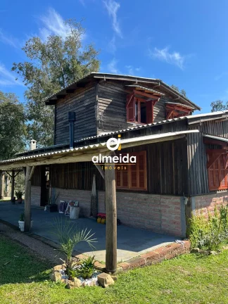 Imagem Chácara 3 dormitórios à venda Zona Rural Butiá/RS