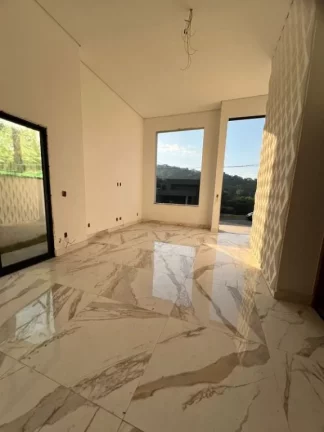Imagem Casa com 3 dormitórios à venda, 150 m² por R$ 1.700.000,00 - Condomínio Aruã - Mogi das Cruzes/SP