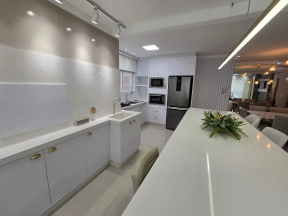 Imagem Apartamento com 3 dormitórios sendo 3 suítes e 2 vagas de garagem em Itapema/SC