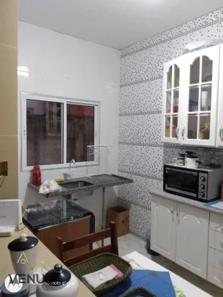 Imagem Sobrado com 2 dormitórios à venda, 90 m² por R$ 380.000,00 - Massaguaçu - Caraguatatuba/SP