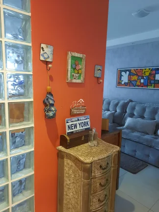 Imagem Excelente oportunidade: Apartamento atualizado com vista no Guarujá-SP, bairro Pitangueiras, 1 quarto, 2 salas, 1 banheiro, 2 vagas de garagem, 65m².