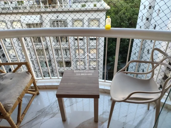 Imagem Imperdível! Apartamento de 2 quartos com suíte e 2 vagas de garagem em Pitangueiras, Guarujá-SP - 78m² de conforto e elegância!