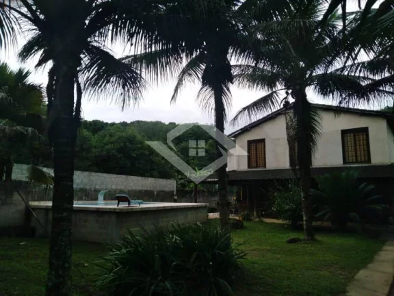 Imagem Casa de 5 Quartos (1 Suíte) em Terreno com 1570 M², Rgi. Ilha De Guaratiba