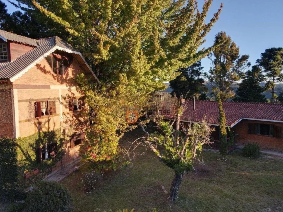 Imagem Casa com 3 dormitórios à venda, 280 m² por R$ 1.220.000 - Alto Do Capivari - Campos do Jordão/SP