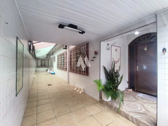 Imagem Casa Térrea com 3 quartos, 4 vagas e edícula - São Vicente / SP
