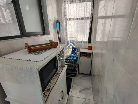 Imagem Apartamento com vista para o mar e lazer na Enseada, Guarujá-SP: 3 quartos, 1 suíte, 2 salas, 2 banheiros, 1 vaga, 106m². Venha conferir!