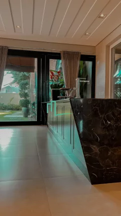 Imagem Magnifica casa com projeto arquitetônico diferenciado e exclusivo em um lote de esquina com 1.050 metros em um dos condominios mais valorizados e proc
