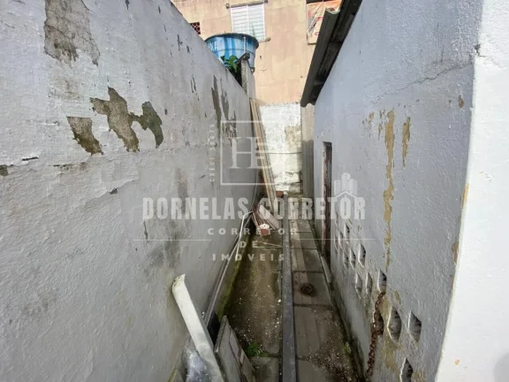 Imagem Casa Espaçosa com 6 Quartos e 2 Suítes à Venda por R$ 600 Mil