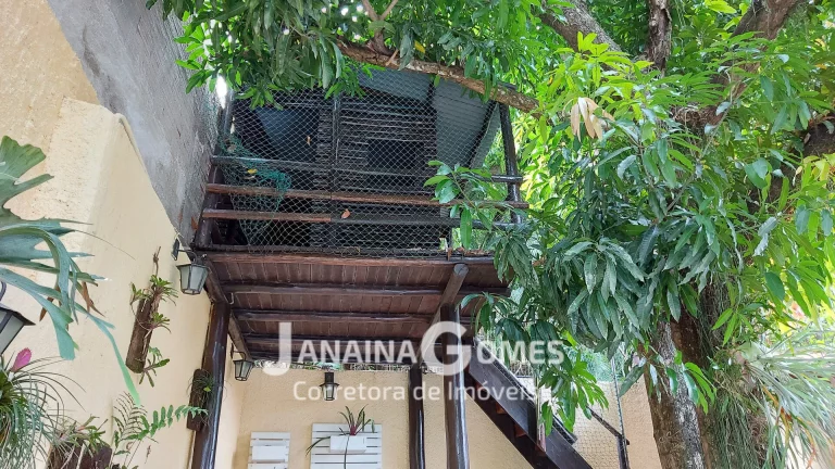 Imagem Casa sofisticada com 4 quartos, 3 suítes, jardins e área de lazer