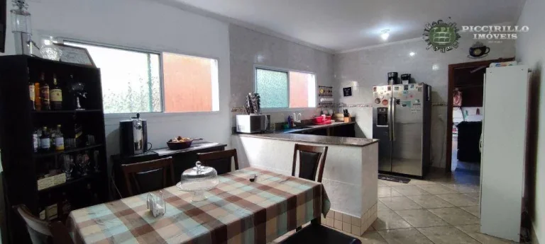 Imagem Sobrado com 3 dormitórios à venda, 118 m² por R$ 680.000,00 - Canto do Forte - Praia Grande/SP