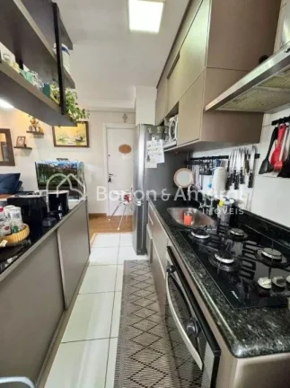 Imagem O imóvel conta com um living acolhedor para dois ambientes, ideal para receber amigos e familiares ...