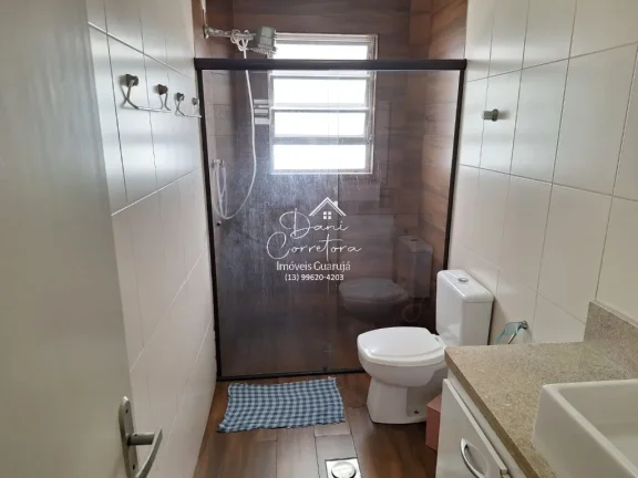 Imagem Imperdível oportunidade, apartamento de 2 quartos sem mobília na rua mais desejada do Guarujá-SP - 65m² - 1 vaga de garagem