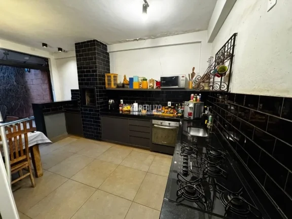 Imagem Casa de 3 dormitórios com suíte e varanda gourmet no Condomínio Vanice Andrade, no bairro Vila Arquelau em Uberaba