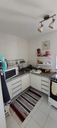 Imagem Imperdível apartamento à venda em Macaé-RJ, Riviera Fluminense! 2 quartos, 1 suíte, 2 salas, 3 banheiros, 2 vagas de garagem. Confira!