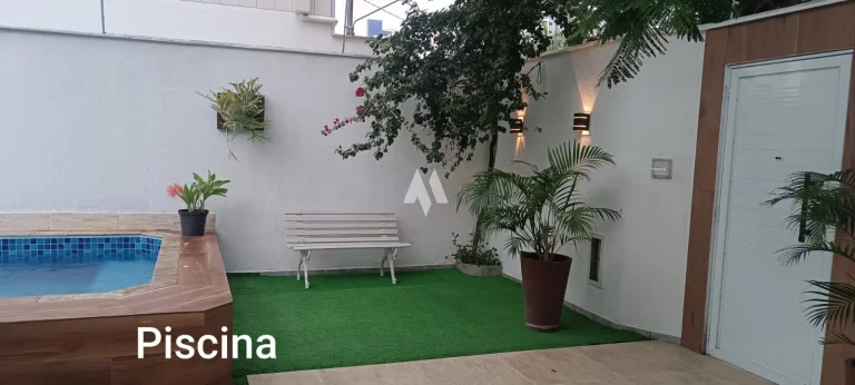 Imagem Sobrado com piscina 3 quartos 2 suítes próximo a praia em Praia Grande