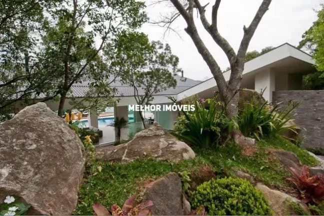 Imagem Casa Alto Padrão mobiliada e decorada á venda com 6 suítes e 8 vagas na Interpraias em Balneário Camboriú.