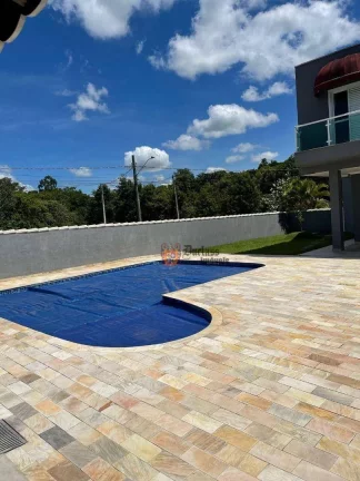 Imagem Sobrado com 4 dormitórios à venda, 395 m² por R$ 2.500.000 - Condomínio Shambala II - Atibaia/SP