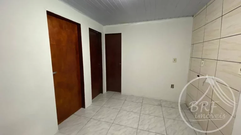 Imagem Vendo terreno com três casas e uma Kitnet em Serraria, São José SC