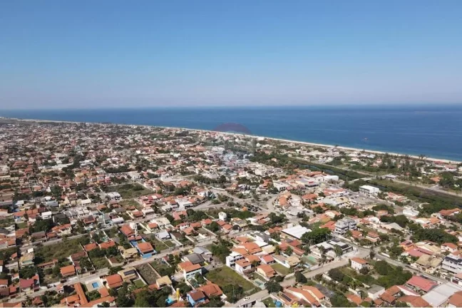 Imagem Terreno plano e murado de frente para o mar na barra de Maricá.