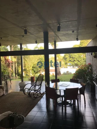 Imagem Casa residencial para Venda Chácara da Lagoa, Itapecerica da Serra 4 dormitórios sendo 4 suítes, 3 salas, 1 vaga, quarto de empregada,.